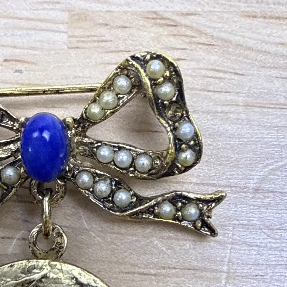 Vintage Jewelry Bow with Seed Pearls Filigree Dangling Blue Lucite Locket Brooch